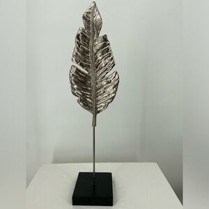 Decorative Silver Leaf mounted on a black Wood Base‎
